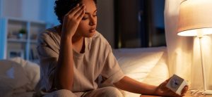 Someone on detox having anxiety and insomnia in bed