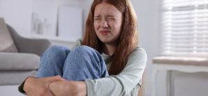 Young Women Looks Stressed Representing The Challenges Of Trying To Detox From Xanax Alone.